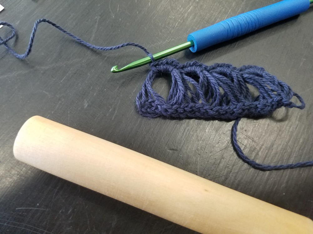 Finished row of broomstick lace clusters