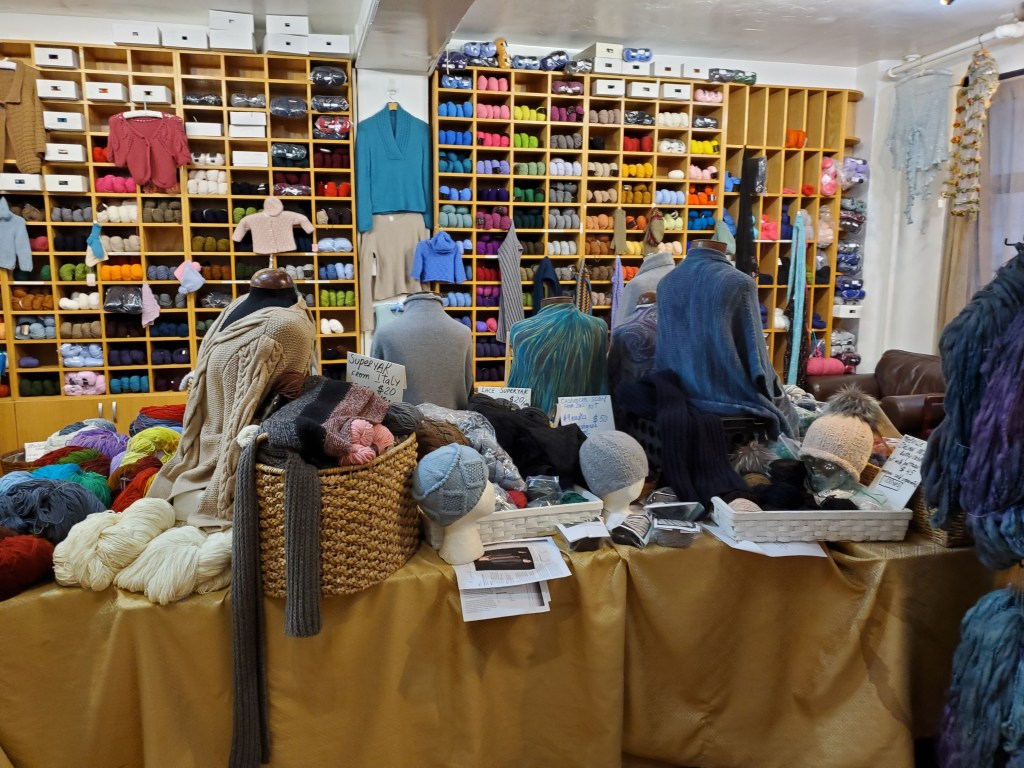 samples and yarn shelves at School Products Yarns