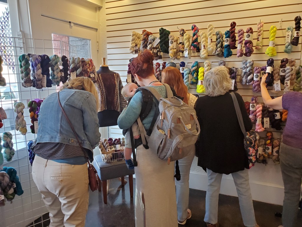 Wall of yarn at Yarn Social
