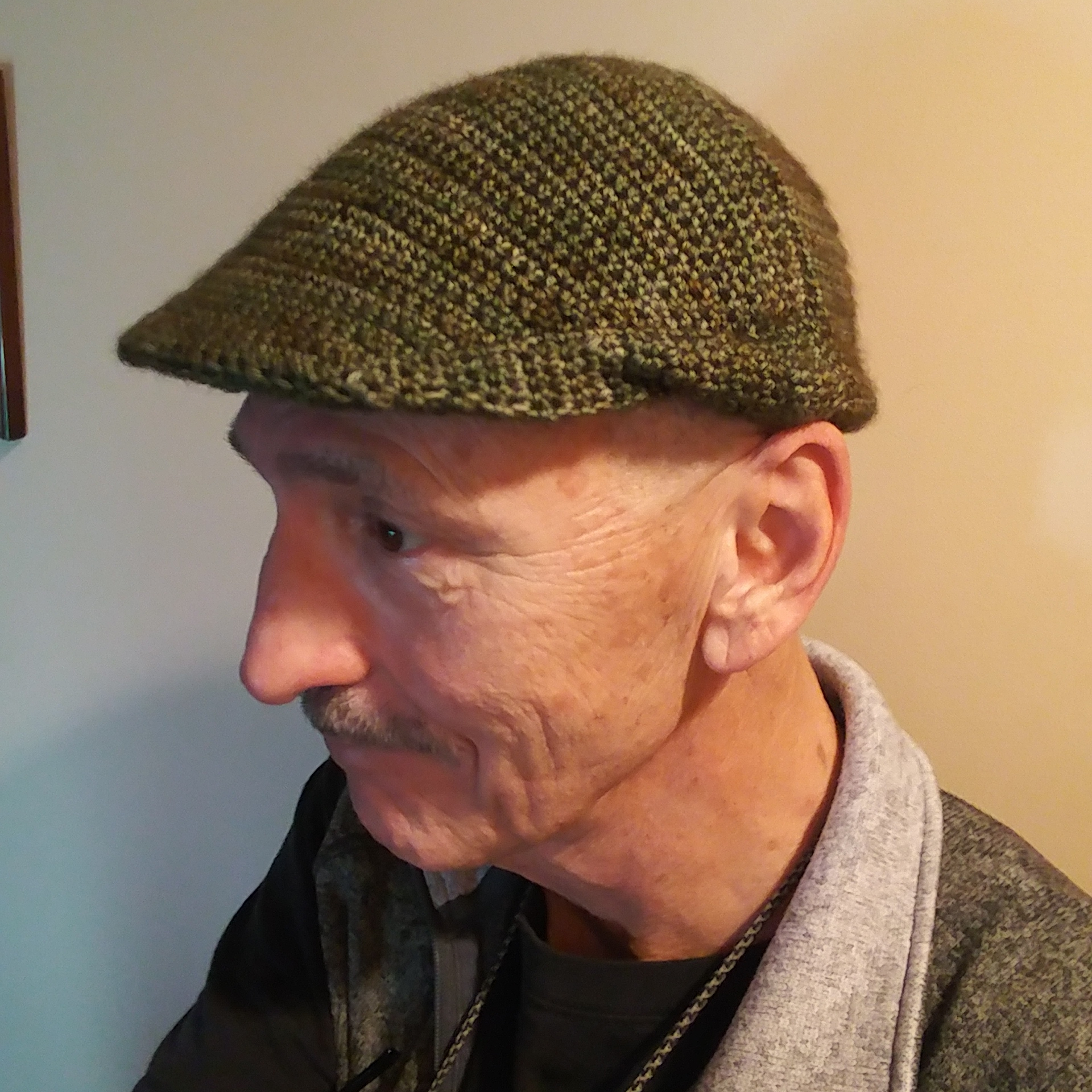 Dad in his crocheted cheese-cutter hat