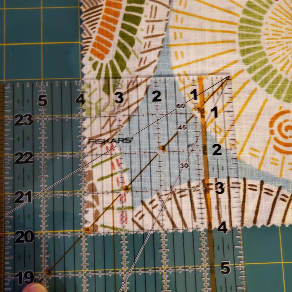 a ruler showing how much to cut off a bag piece