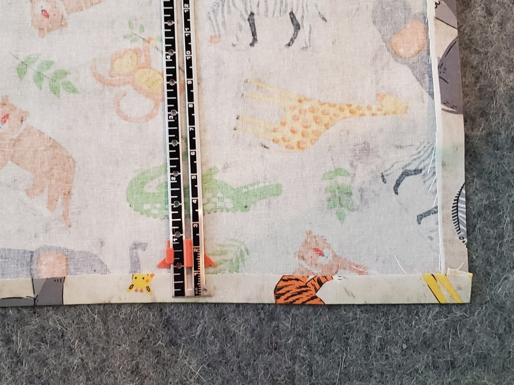 cotton with 1/2" edge turned up and pressed