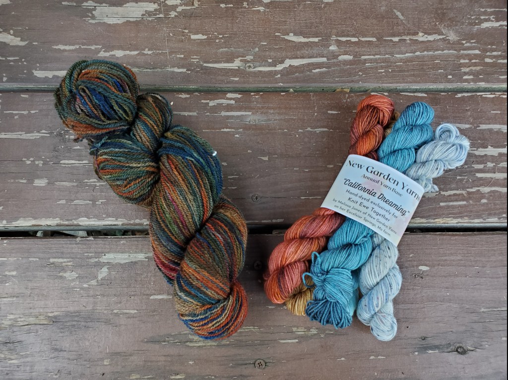 a full skein of yarn and a set of minis