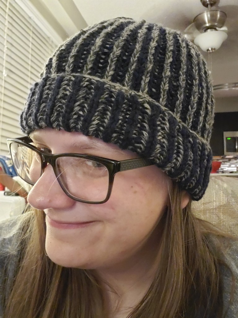 Emma modeling a brioche knit cap