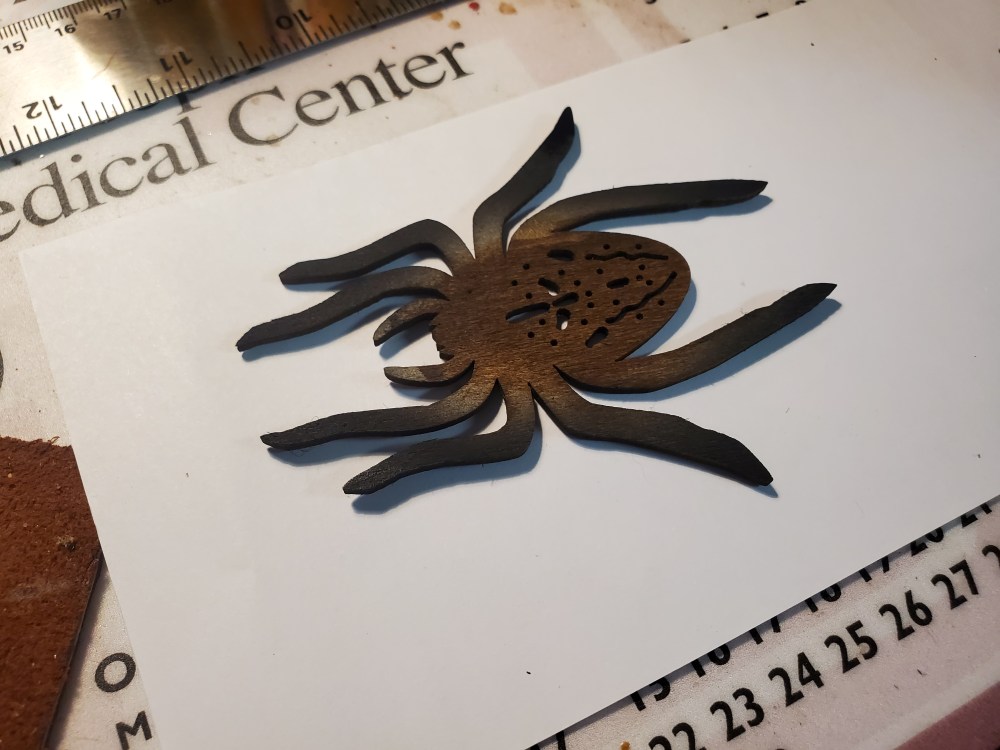 painted wooden spider
