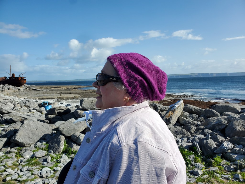 Mom modeling her purple hat