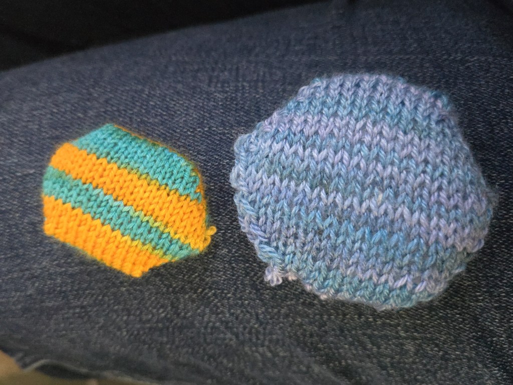CDM Hexipuff next to a hand-knit Hexipuff